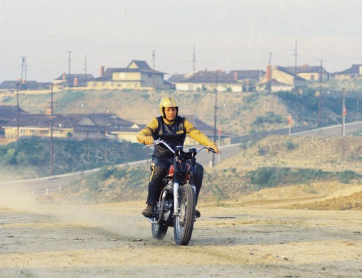 Evel Knievel Riding Motorcycle On Dirt Track
