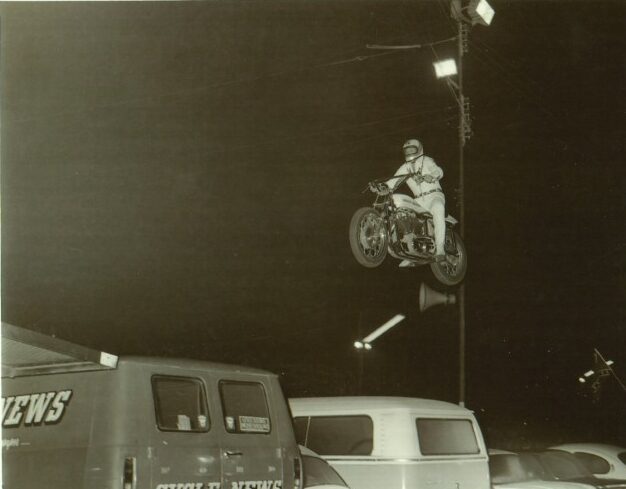 Evel Knievel Motorcycle Jump Stunt Over Vans