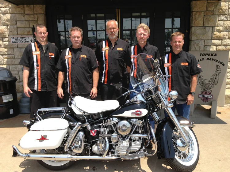 Harley-Davidson Team With Restored Motorcycle